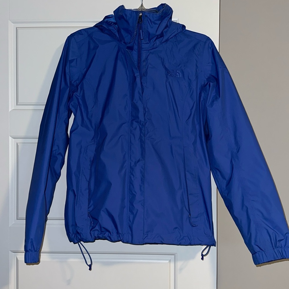 Women’s North Face wind breaker with packable hood. Worn once! Size medium
